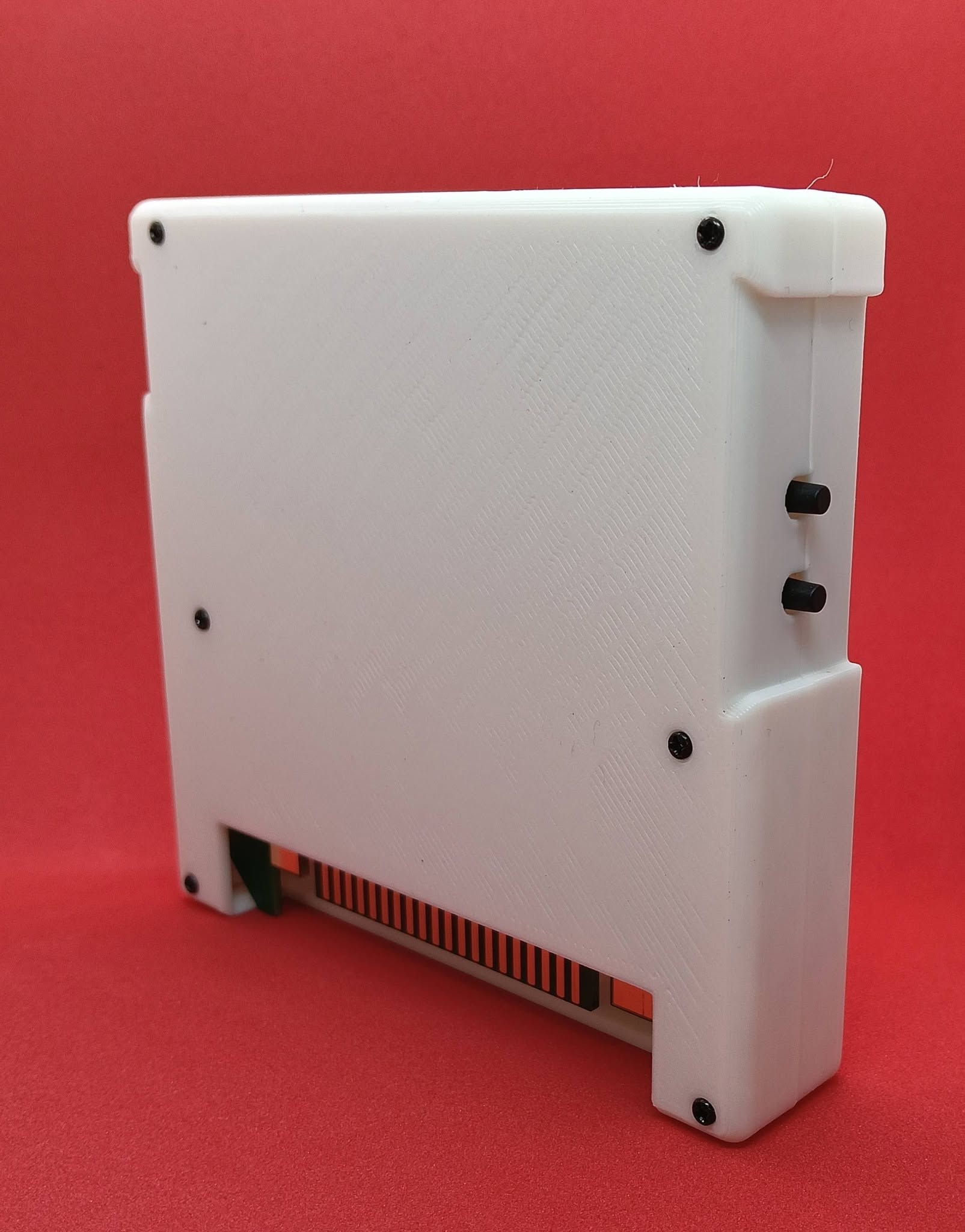 Rear of the HDMI Cart showing the cartridge edge connector and two side buttons